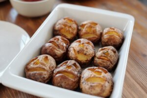 carved potatoes in a ceramic tray