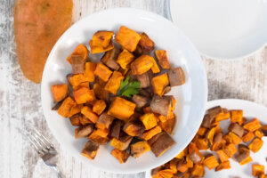 cubed sweet potato in white bowl