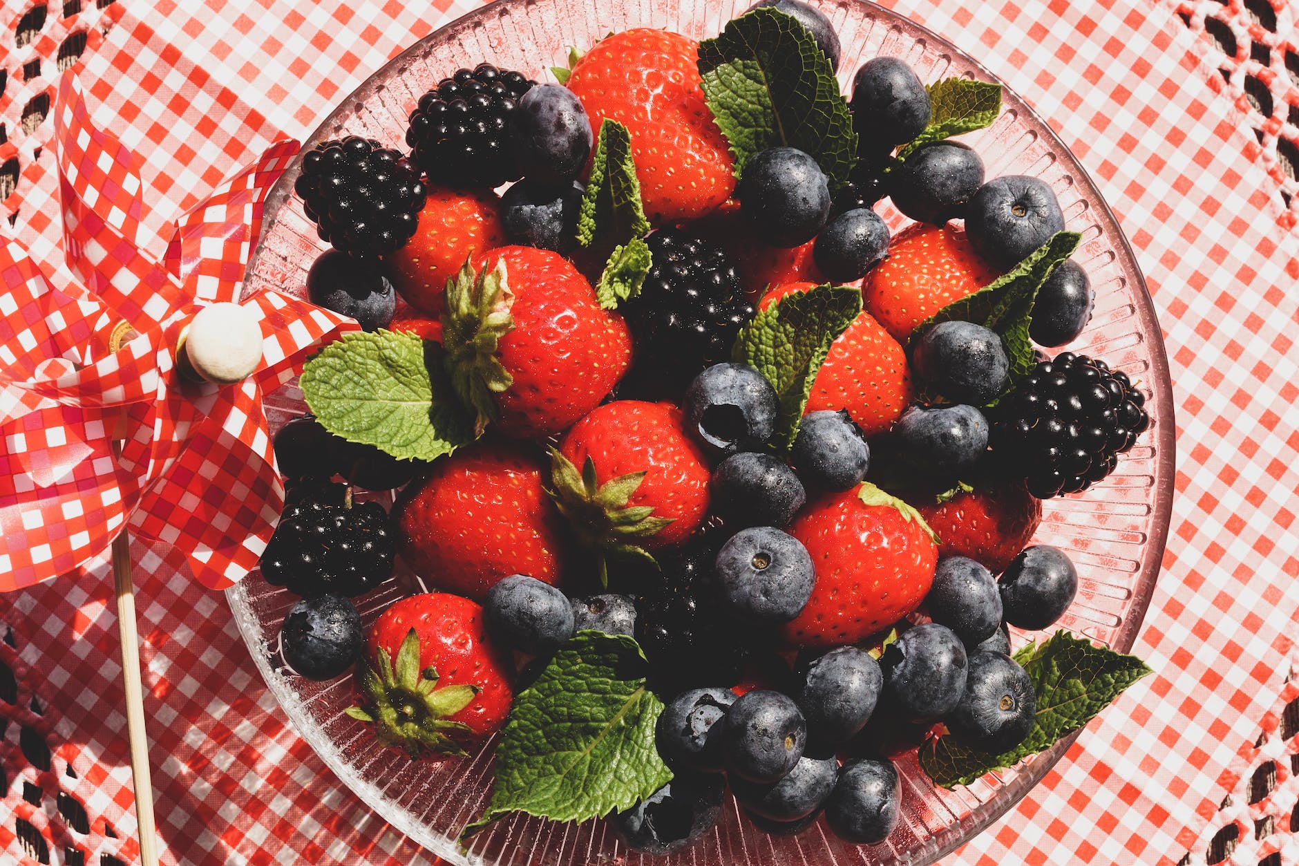 strawberries and blueberries on glass bowl Road Trip Snacks (Non Refrigerated