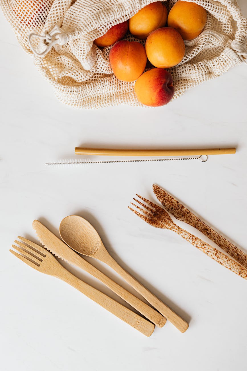 cotton sack with ripe peaches and diverse cutlery on table Road Trip Snacks (Non Refrigerated