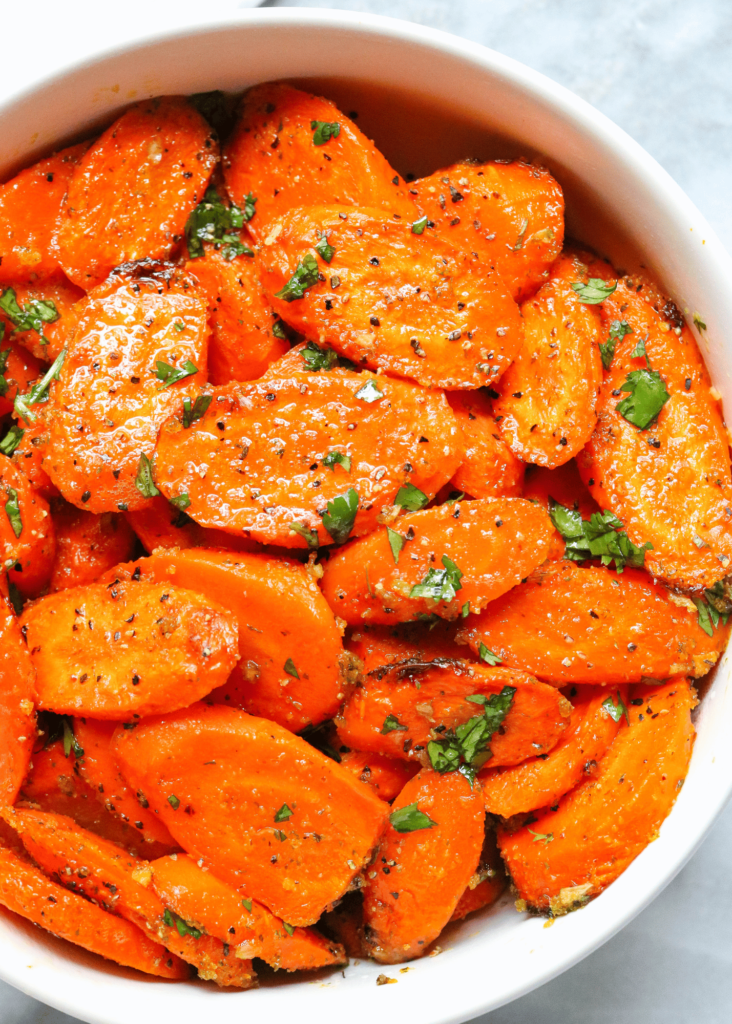 buttered carrots in a white bowl