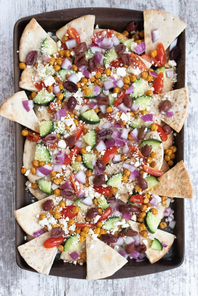 pita nachos on a baking dish