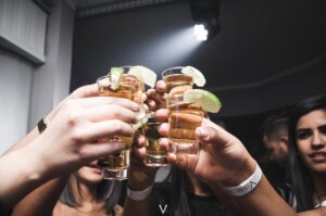 photo of people doing cheers