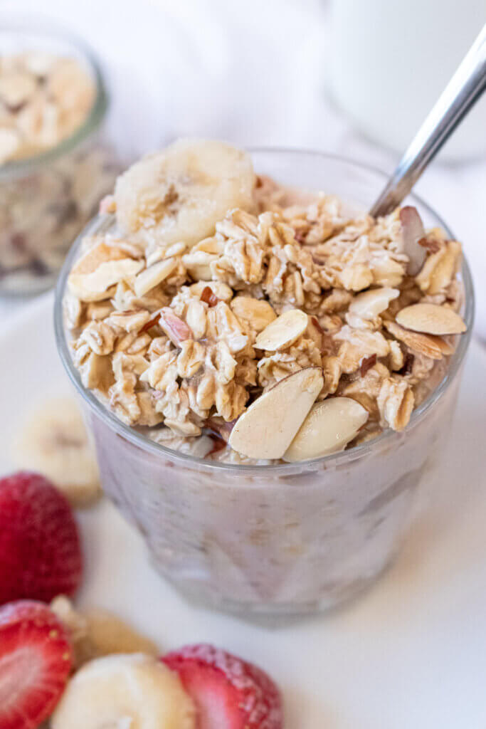 Overnight oats with frozen fruit with spoon