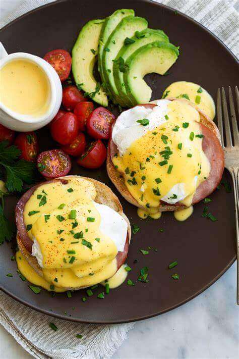 e foods: eggs benedict with avocado and tomatoes