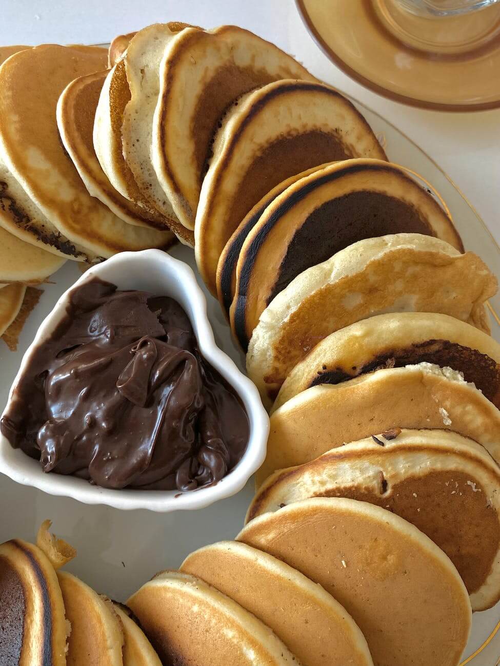 photo of pancakes with chocolate paste