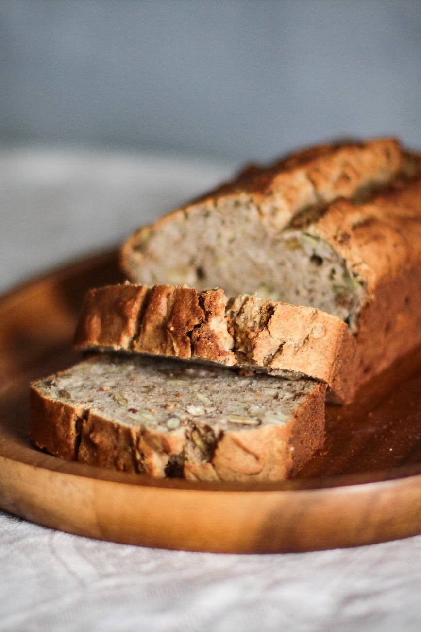 close up photo of high fiber bread on brown wooden tray