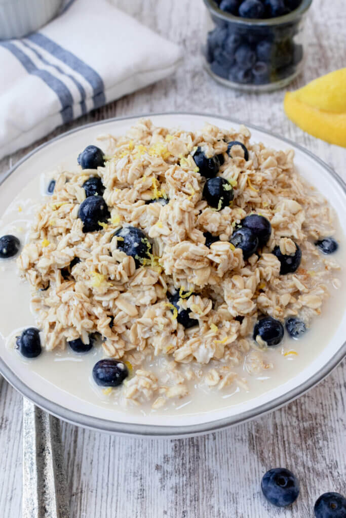 blueberry lemon overnight oats in white bowl