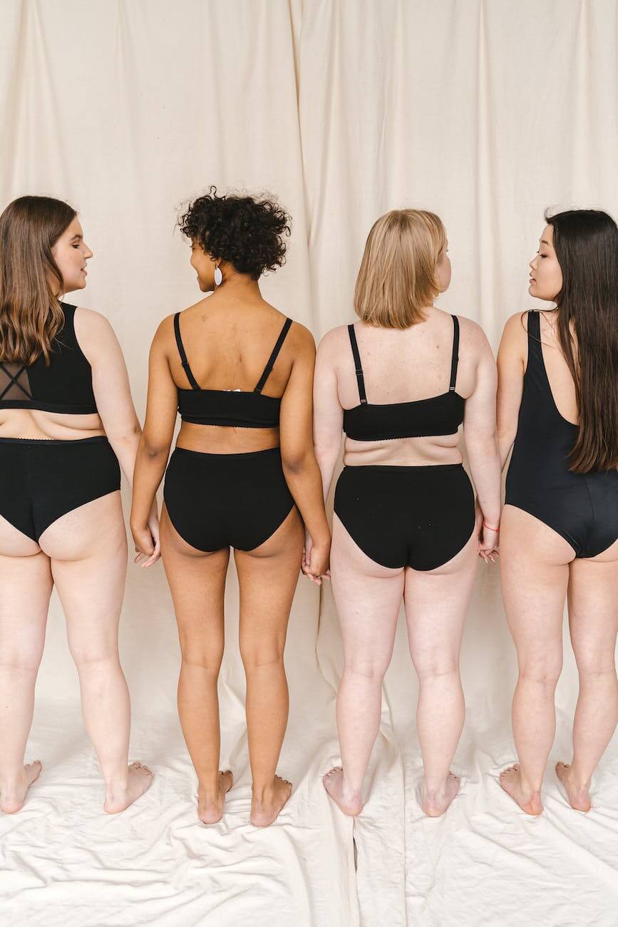 a group of women in black swimsuit standing Anything Is Possible If You Believe In Yourself