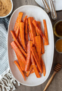 brown sugar honey glazed carrots on white dish