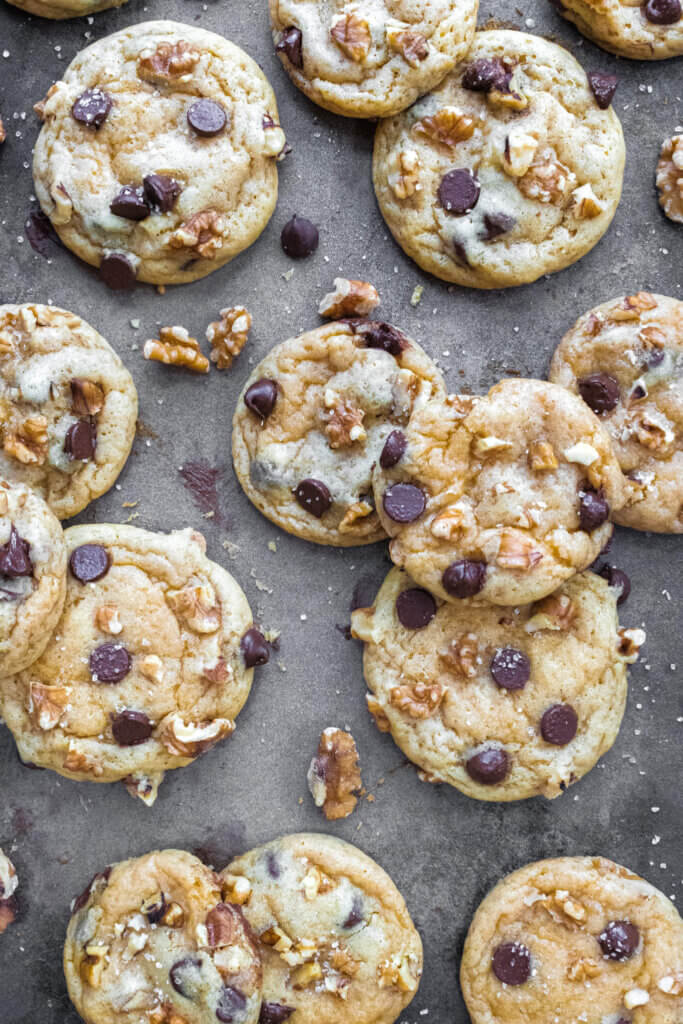 chocolate chip walnut cookies on baking sheet