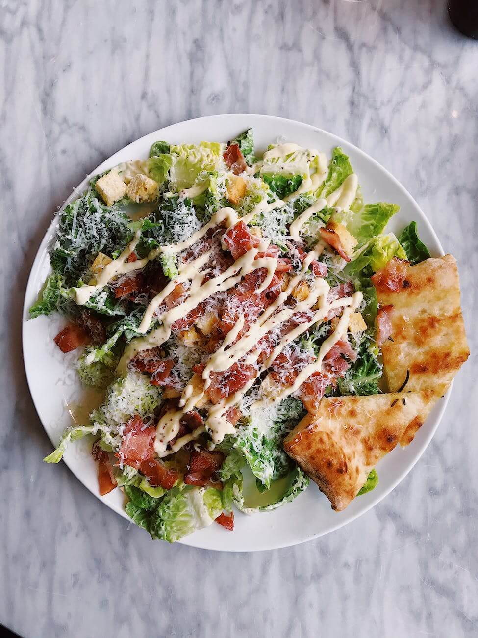 salad toppings on white plate