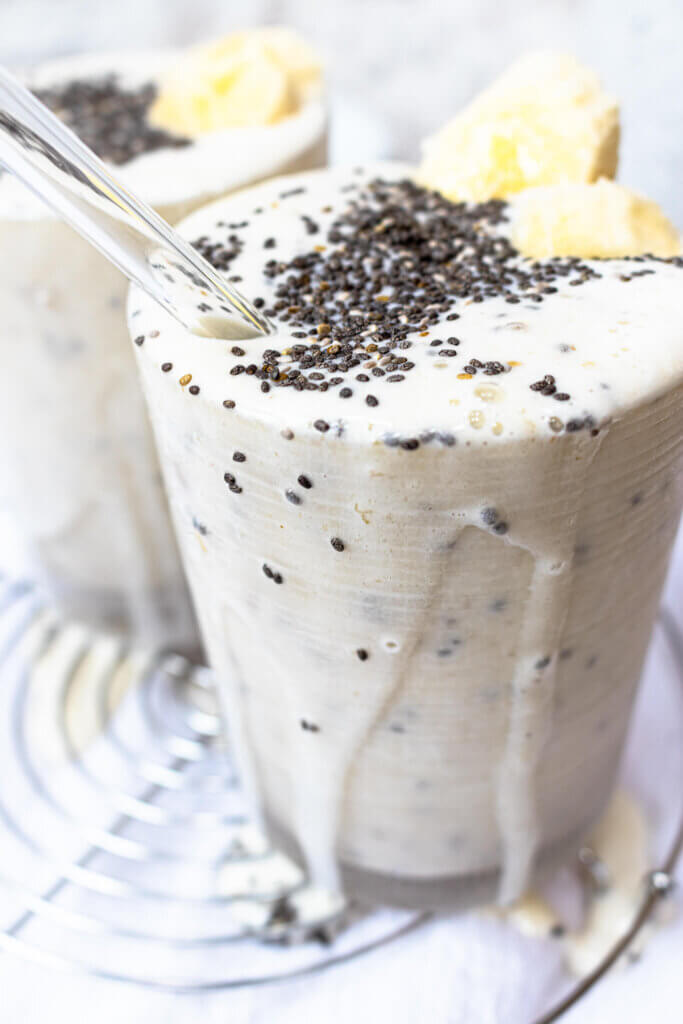 banana chia smoothie with chia seeds on top