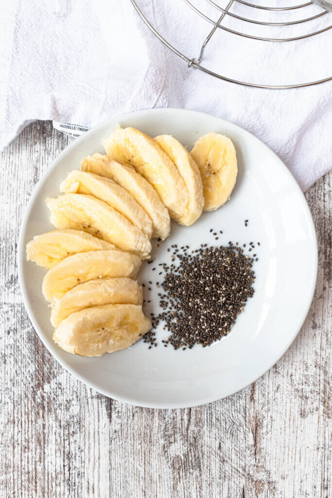 Banana slices and chia seeds on plate