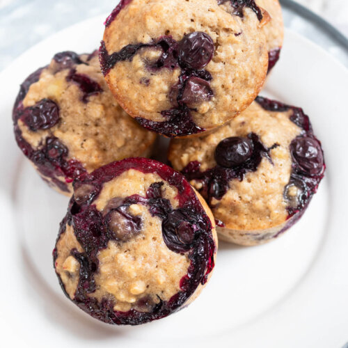 Oatmeal Blueberry Banana Muffins on white plate