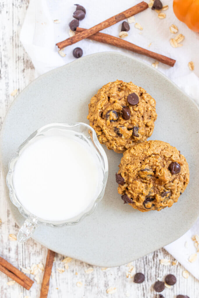 Pumpkin Oatmeal Cookies on a plate with milk