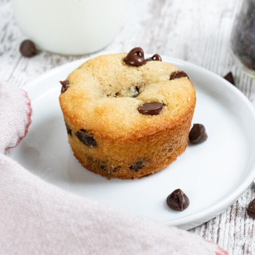 almond flour chocolate chip muffin on white plate