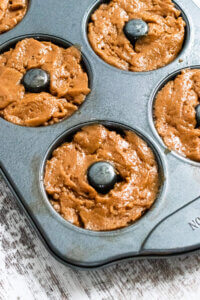 donut pan with dough