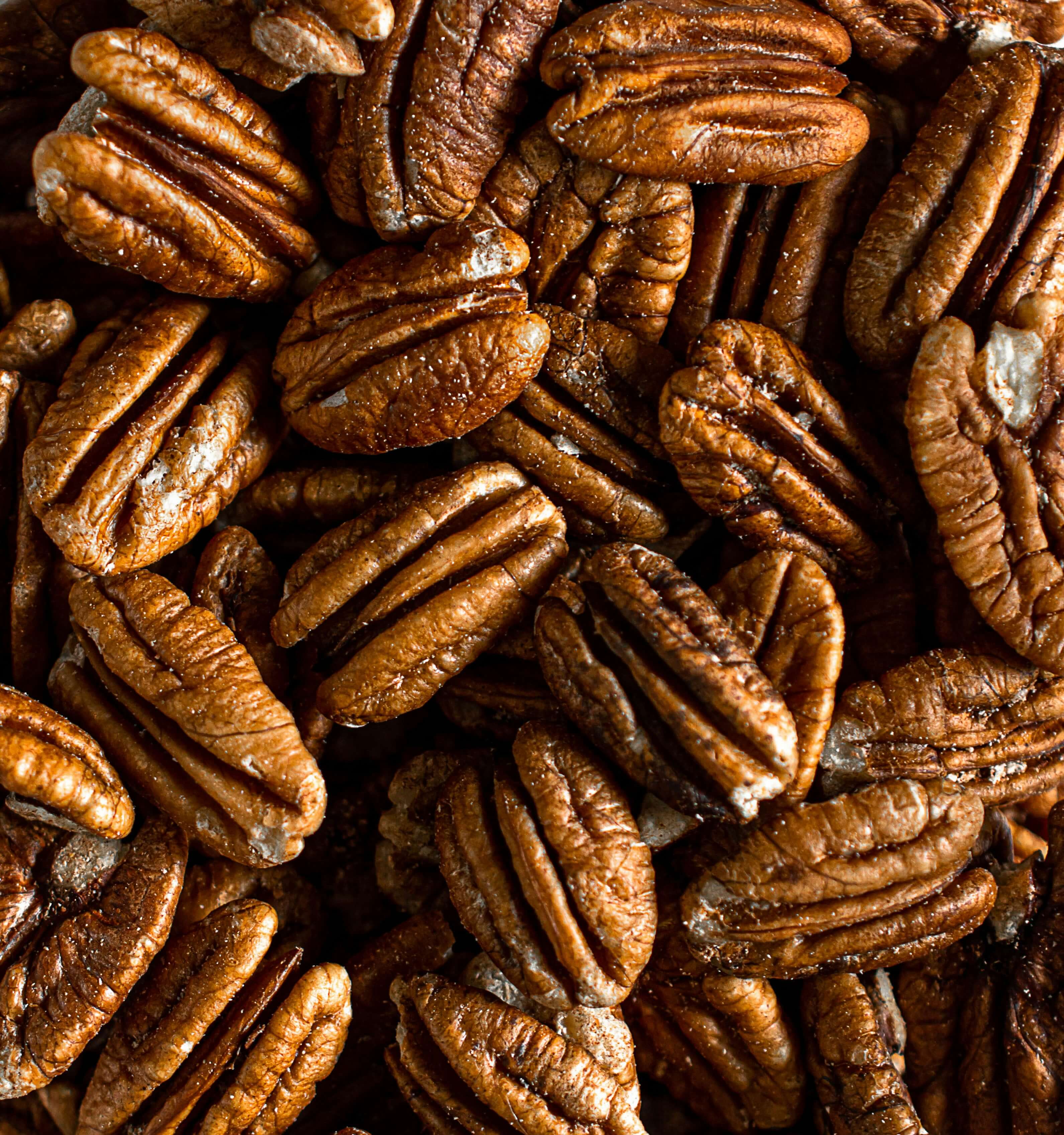 many pecans stacked