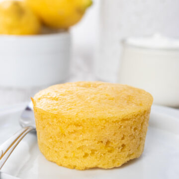 Lemon Yogurt Muffins on two white plates