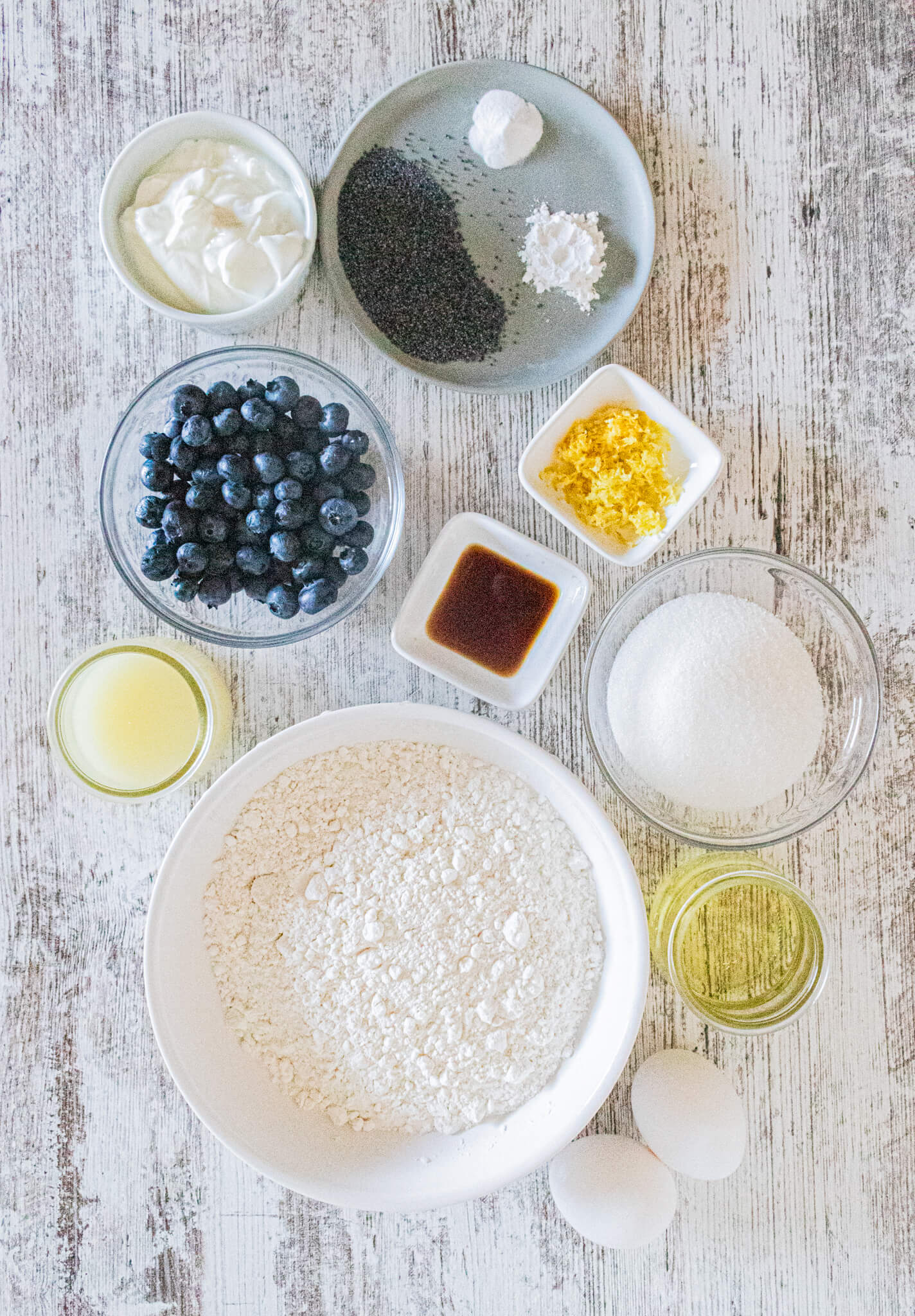 Ingredients to make lemon blueberry poppyseed muffins
