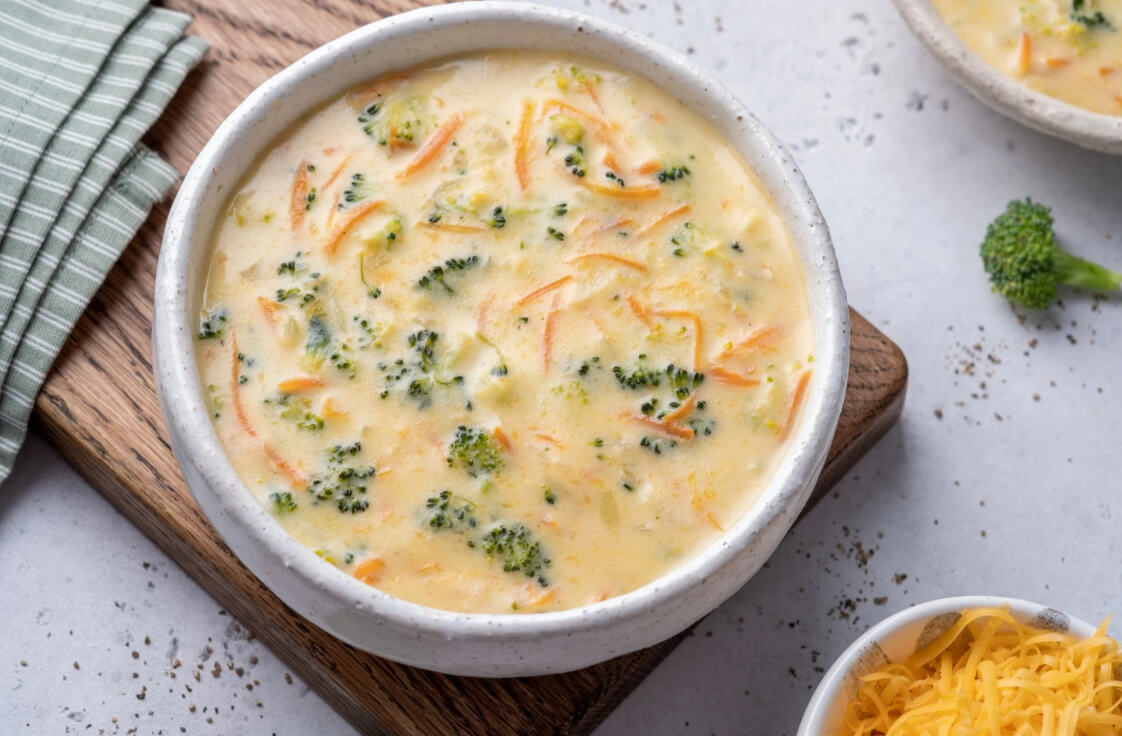 broccoli cheese soup in white bowl