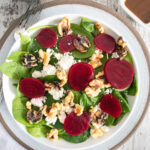 beetroot, feta, and walnut salad on spinach