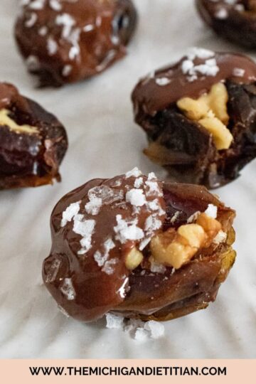 Delicious dates stuffed with walnuts and dipped in chocolate